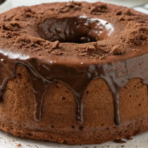Chocolate Orange Angel Food Cake Simple Elegant Dessert - Light, Bright, And Crowd-Pleasing 2 Chocolate orange angel food cake with cocoa topping and glossy chocolate glaze dripping over a light airy sponge